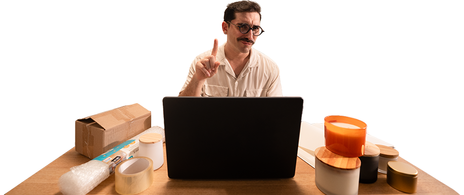 Man at his desk asking you to wait a second